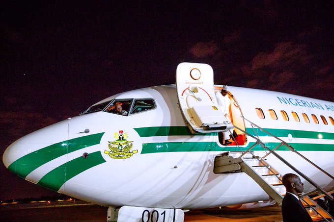 Buhari disembarks from his Nigerian Air Force plane 001