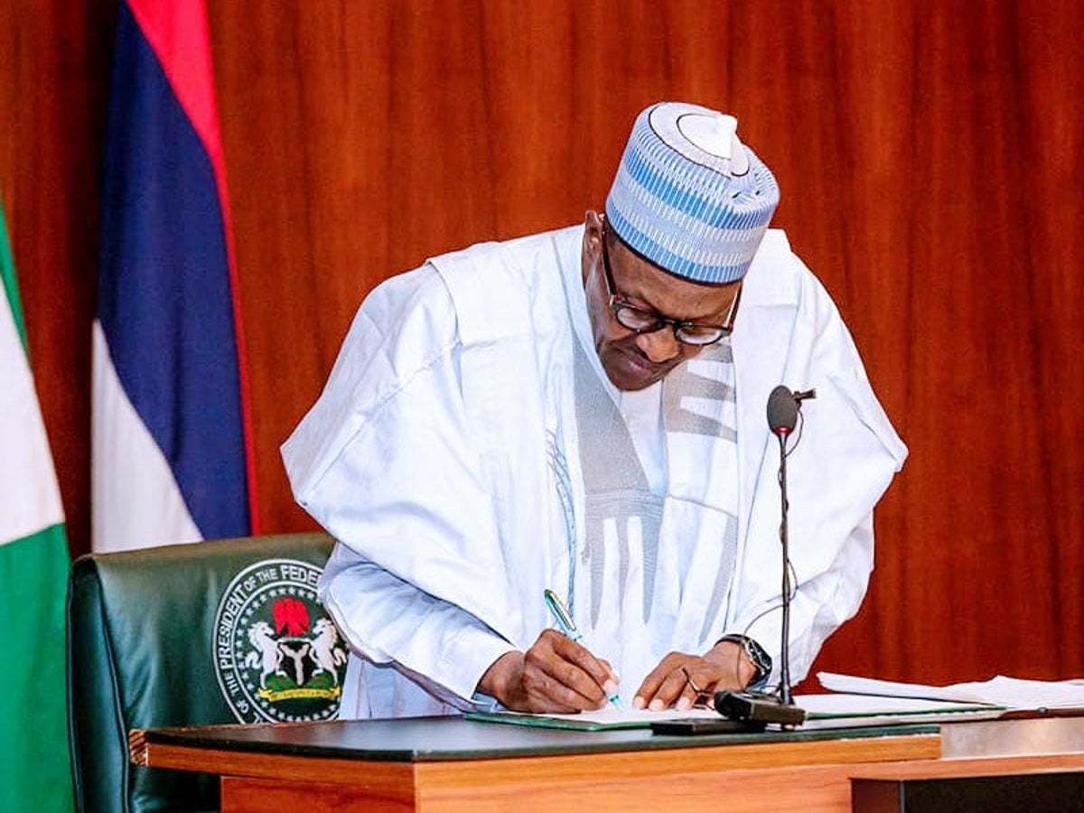 President Buhari signs 1 1
