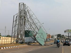 A billboard affected by Friday nights heavy storm before Fate Roundabout in Ilorin.
