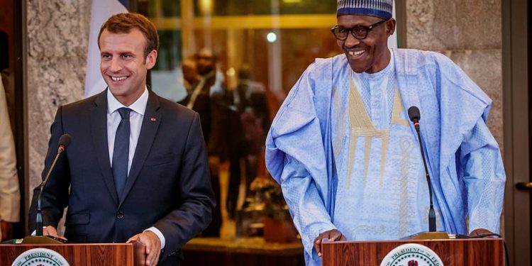 L R Presidents Emmanuel Macron and Muhammadu Buhari