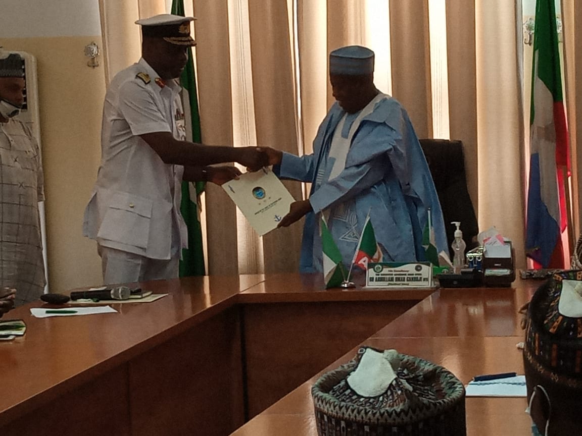 R L Kano State Gov. Abdullahi Umar Ganduje with Chief of Policy and Plans Nigerian Navy Real Admiral COR Ezekobe