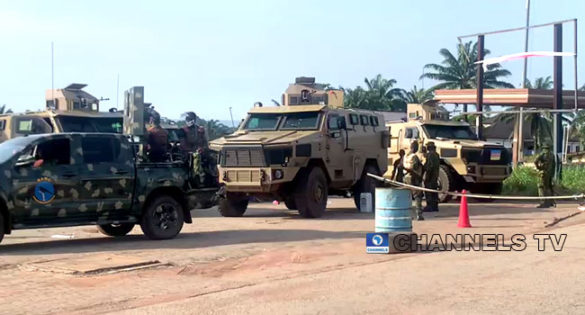Patrol vehicles of the Nigerian Army are seen at a military checkpoint along the Ozubulu Road in Nnewi. 2