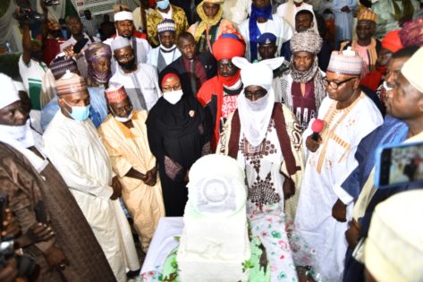 Emir of Zazzau Ambassador Ahmed Nuhu Bamalli cutting the centenary cake