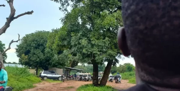 Smugglers lined up at a Benin security post to pay their dues